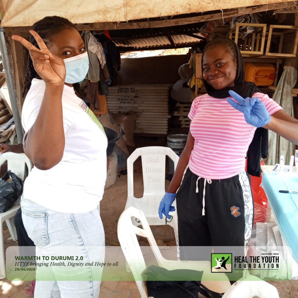 Two of the volunteers taking a pose.