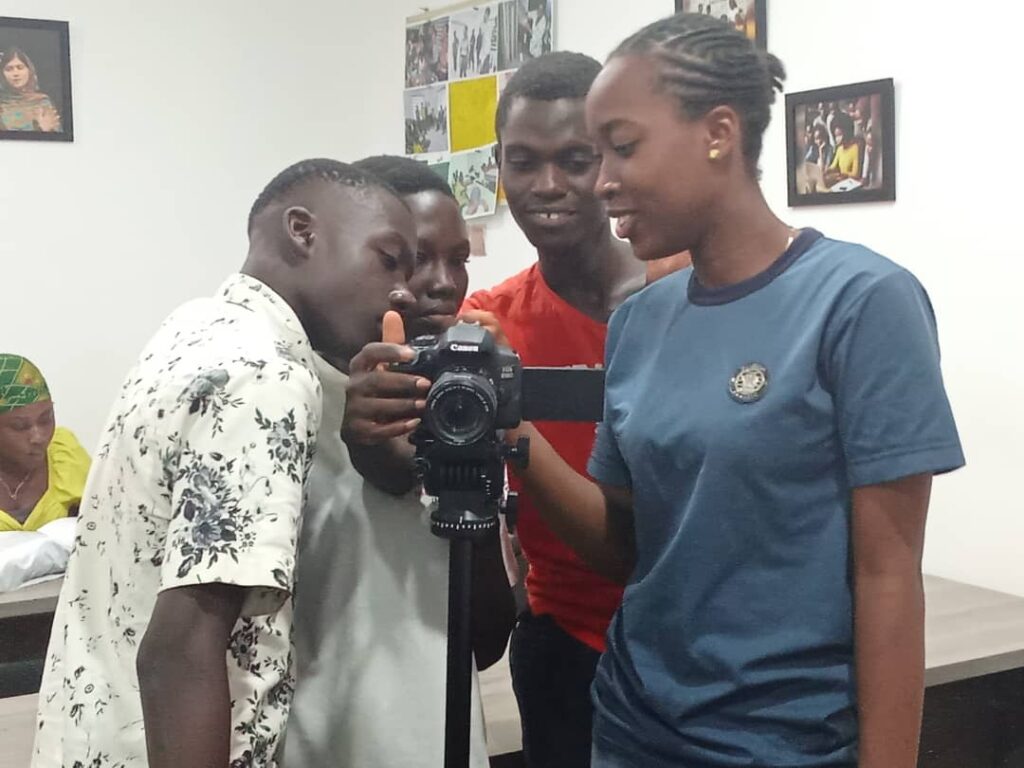 Adaobi during photography youth skills development at Heal The Youth Foundation's AYP Tech Hub in Nigeria