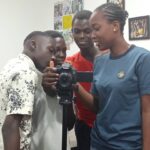 Adaobi during photography youth skills development at Heal The Youth Foundation's AYP Tech Hub in Nigeria